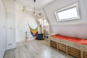 Mansard room with minimalist interior design