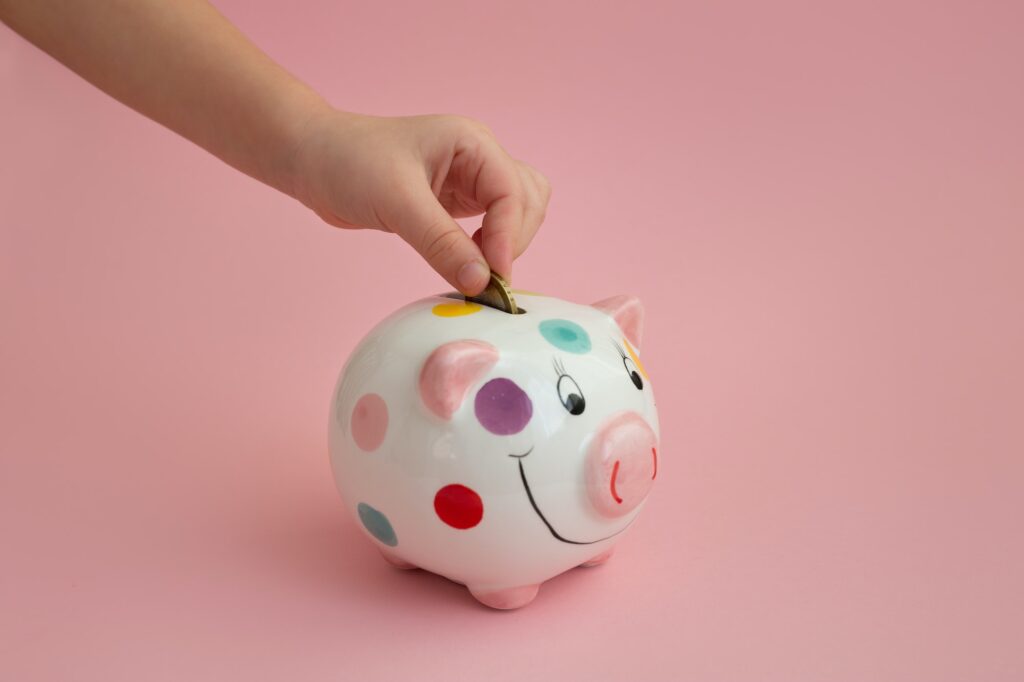 Piggy bank piggy is painted in colorful polka dots